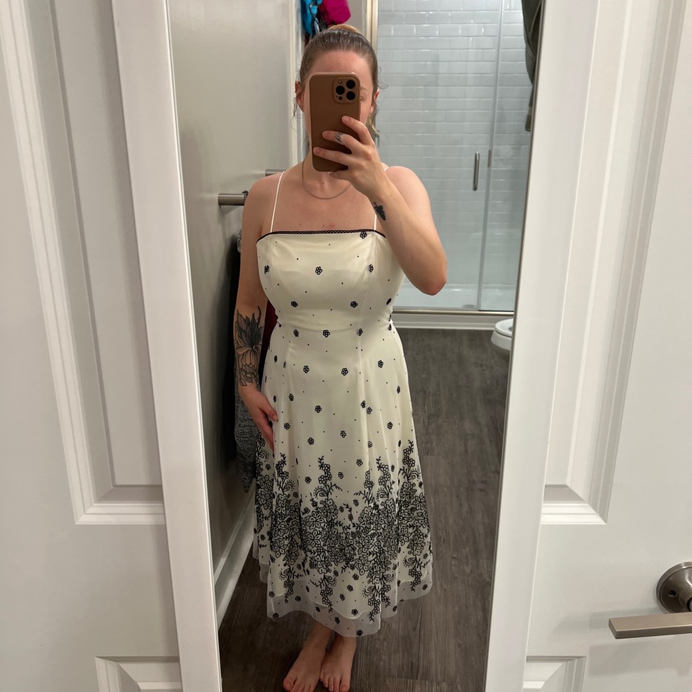Elegant White and Black Beaded Floral Dress